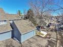 Aerial view of homes, highlighting the neighborhood layout and architectural details at 10626 W Park Mtn, Littleton, CO 80127