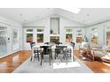 Bright dining room with vaulted ceilings and abundant natural light at 3608 S Newport Way, Denver, CO 80237