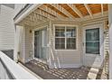 Comfortable balcony with sliding glass door, perfect for relaxing outdoors at 12625 E Pacific Cir # E, Aurora, CO 80014