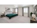 Bright main bedroom with soft carpet, neutral walls, large windows with curtains, and stylish furnishings at 18120 Dandy Brush Ln, Parker, CO 80134