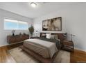 Serene bedroom with a platform bed, modern decor, and ample natural light at 828 Mariposa St, Denver, CO 80204