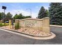 Pinnacle Ranch community sign with beautiful landscaping and rocks at 9944 E Carolina Cir # 201, Aurora, CO 80247