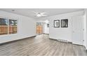 Open living area features updated flooring, and a neutral color scheme at 7999 Chase Cir # 31, Arvada, CO 80003