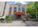 Charming brick apartment building with manicured landscaping, located at 1130 Penn at 1130 N Pennsylvania St # 208, Denver, CO 80203