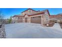 Spacious three-car garage with ample parking space on a concrete driveway at 5478 Water Oak Cir, Castle Rock, CO 80108