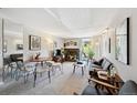Bright living room featuring a fireplace and sliding glass doors leading to a balcony at 805 29Th St # 308, Boulder, CO 80303