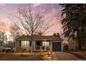 House exterior at sunset, showcasing curb appeal at 2602 S Lafayette St, Denver, CO 80210