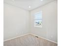 Bright and airy bedroom with neutral carpeting and window blinds at 8869 Sedalia St, Commerce City, CO 80022