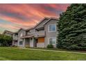 Charming multi-Gathering exterior view featuring lush green lawn and well-kept landscaping at 908 S Yampa St # 208, Aurora, CO 80017