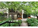 Exterior view of the home showcasing the front entrance and surrounding greenery at 960 N Pennsylvania St # 6, Denver, CO 80203