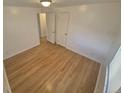 A comfortable bedroom with hardwood floors and neutral walls at 588 Empire St, Aurora, CO 80010