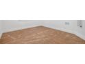 Unfinished basement with concrete floors and white trim, offering potential for customization at 19232 E Adriatic Pl, Aurora, CO 80013