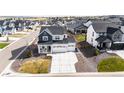 An aerial view of a home with a three-car garage, situated in a Gathering-friendly neighborhood at 1308 E Hopkins Dr, Elizabeth, CO 80107