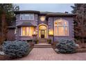 Elegant home with brick facade and welcoming entryway at 98 Glenmoor Ln, Cherry Hills Village, CO 80113