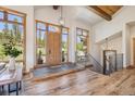 Grand entryway with hardwood floors, large windows, and mountain views at 41 Barton Ridge Dr, Breckenridge, CO 80424