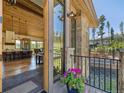 Bright living space view from the deck, with a modern kitchen visible and mountain views at 41 Barton Ridge Dr, Breckenridge, CO 80424