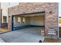 Spacious two-car garage with ample room for parking and storage at 11481 E Briarwood Cir, Centennial, CO 80112