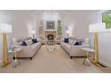Bright living room with vaulted ceilings, a fireplace, and neutral decor at 5227 S Geneva St, Englewood, CO 80111