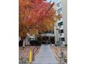Building entrance with beautiful fall foliage and easy access walkway at 13601 E Marina Dr # 510, Aurora, CO 80014