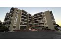 A low angle exterior view of a multi-story residential building at 13601 E Marina Dr # 510, Aurora, CO 80014