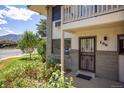 Inviting exterior view of property featuring an attractive front garden and a unit number 106 at 645 Manhattan Pl # 106, Boulder, CO 80303