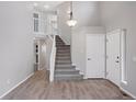 Entryway with a stairway and view of upstairs at 20481 E Mansfield Pl, Aurora, CO 80013