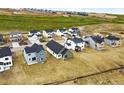 Aerial view of new construction homes showcasing the community layout and surrounding landscape at 39732 Penn Rd, Elizabeth, CO 80107