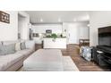 Beautiful living space with open floor plan, modern finishes, and seamless flow to other areas at 9287 Twenty Mile Rd # 204, Parker, CO 80134