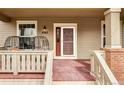 Inviting front porch featuring comfortable seating and a clear view of the home's entrance at 4363 W 118Th Way, Westminster, CO 80031