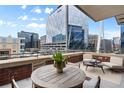 Comfortable outdoor seating on a spacious balcony, showcasing a prime view of the cityscape and architectural design at 2100 16Th St # 600, Denver, CO 80202