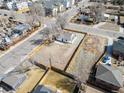 Expansive aerial view of the property showcases its well-defined boundaries and ample space for outdoor activities at 801 S Leyden St, Denver, CO 80224