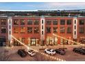 Stunning building exterior with well-lit storefronts and ample parking, creating an inviting commercial space at 7110 W Alaska Dr # A, Lakewood, CO 80226