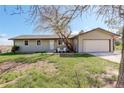 Charming single story home featuring a front yard, two car garage and cozy entryway at 2166 Appaloosa Trl, Elizabeth, CO 80107