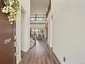 Spacious entryway with hardwood floors offering a view of the home's interior at 5737 Amarosa Dr, Parker, CO 80134