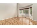 Bright living room with hardwood floors and a bay window at 821 S 34Th Ave, Brighton, CO 80601