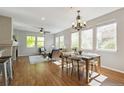 Spacious living room and dining room with large windows for natural light at 14247 W 84Th Cir # A, Arvada, CO 80005