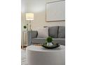 Living room detail showing a stylish coffee table and sofa at 20954 E Crestline Pl, Centennial, CO 80015