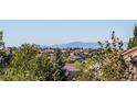 Scenic view showcasing distant mountains and the surrounding neighborhood from the property at 22932 E Ontario Dr # 102, Aurora, CO 80016