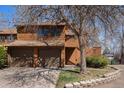 Charming exterior view of the home, showcasing a two-car garage and inviting front entrance at 2279 E 129Th Ave, Thornton, CO 80241