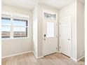 Bright entryway with a window and closet space at 741 N Tibet St, Aurora, CO 80018