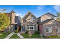 Lovely home with a welcoming walkway, bay window, and green lawn at 1832 W 36Th Ave, Denver, CO 80211