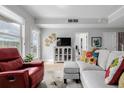 Comfortable living room featuring a large window, seating area, and contemporary decor at 1975 N Grant St # 509, Denver, CO 80203