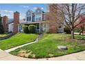 Charming townhouse boasting a well-kept lawn, beautiful landscaping, and inviting curb appeal at 8220 W 90Th Pl # 2003, Broomfield, CO 80021