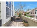 Cozy patio area features comfortable seating and tasteful decor, perfect for outdoor relaxation at 5872 W Asbury Pl, Lakewood, CO 80227