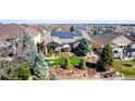 Backyard aerial view featuring a patio and solar panels on the roof at 23644 E Phillips Pl, Aurora, CO 80016