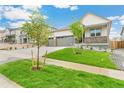 Beautiful single-Gathering home featuring a spacious three-car garage at 13497 Valentia St, Thornton, CO 80602