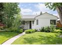 Charming home with a well-maintained lawn and appealing curb appeal at 1185 S Steele St, Denver, CO 80210