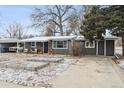 Charming home exterior with a well-maintained yard and inviting curb appeal at 701 S Roosevelt Ave, Lafayette, CO 80026