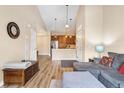 Bright living room featuring modern furnishings and neutral decor at 8779 S Kipling Way # 204, Littleton, CO 80127