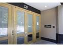 Building entrance featuring glass paneled doors with the address '720' displayed above at 720 16Th St # 513, Denver, CO 80202